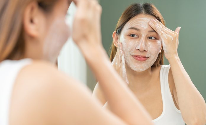 Women Applying Face Scrub